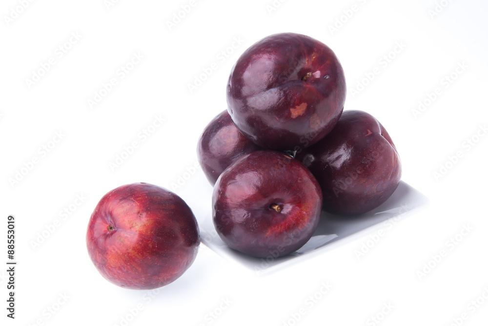 Plum. Ripe plum fruit on background