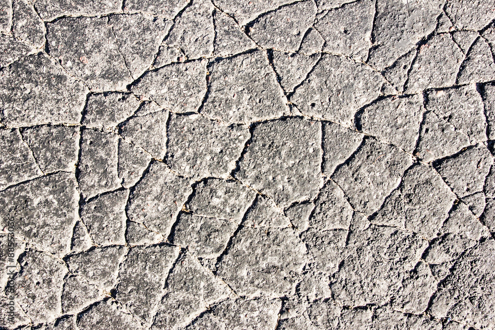 Cracked asphalt grunge texture. Cracked asphalt grunge texture.