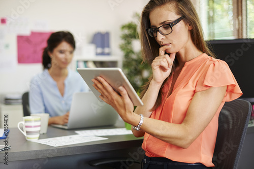 Worried woman looking for solution in the Internet