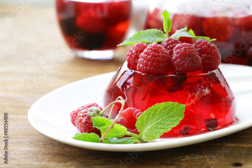 Bild auf Leinwand berry fruit jelly with fresh berries - summer dessert