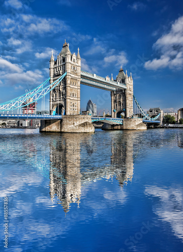 Famous Tower Bridge against blue sky in London, England photo