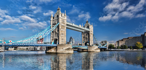 Famous Tower Bridge with flag of England in London, UK #88557895