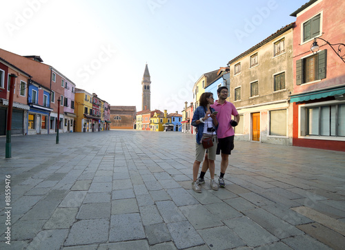 married couple visiting the island of Burano near Venice