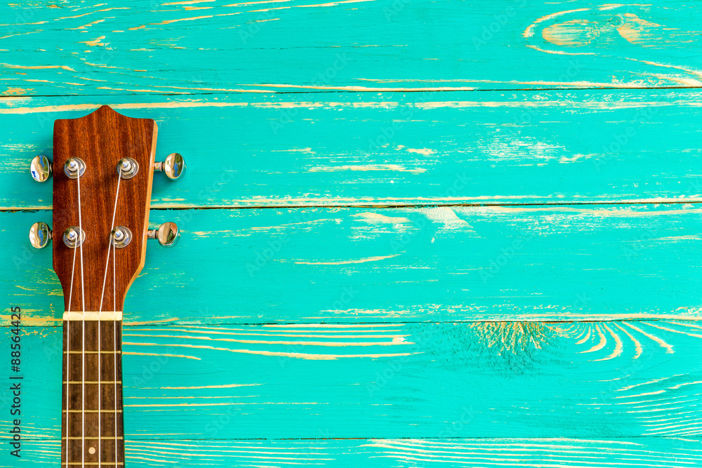Obraz premium Ukulele Background / Ukulele / Ukulele on Blue Wooden Background