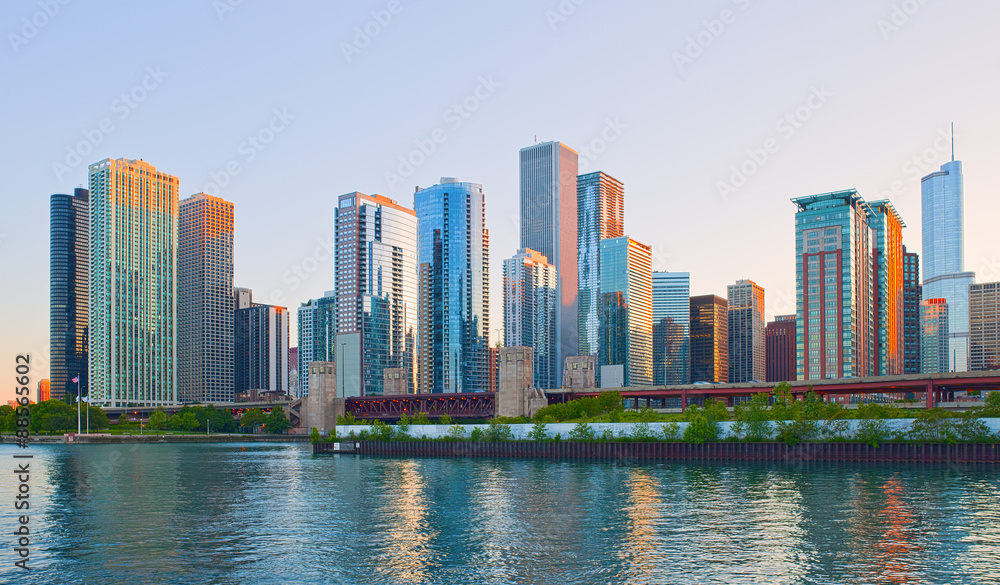 Fototapeta Chicago Illinois skyline at sunset with illuminated downtown buildings