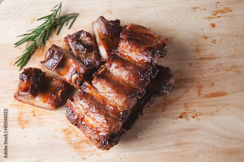 grilled pork rib on wooden board photo