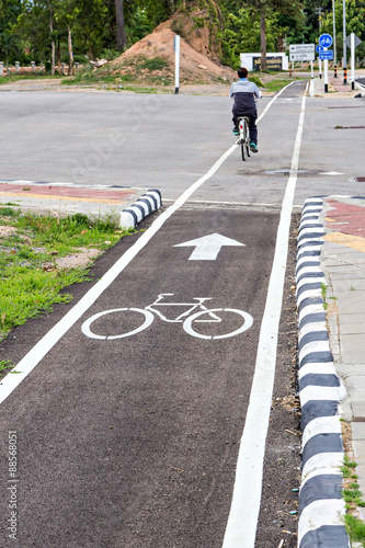 Bicycle lane sign on the road focus on symbol