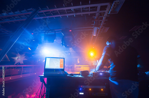 Vászonkép DJ in the night club