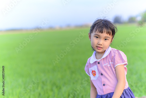 Little girl with school uniform © PathomP