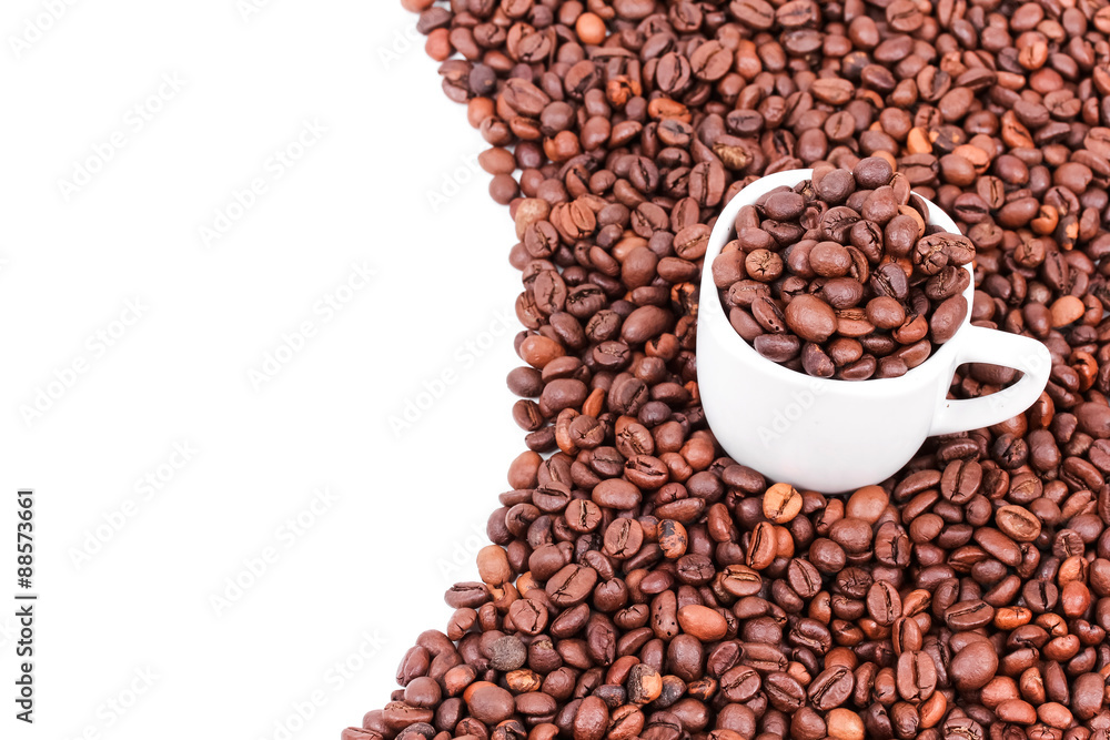 Fototapeta premium White cup with coffee beans
