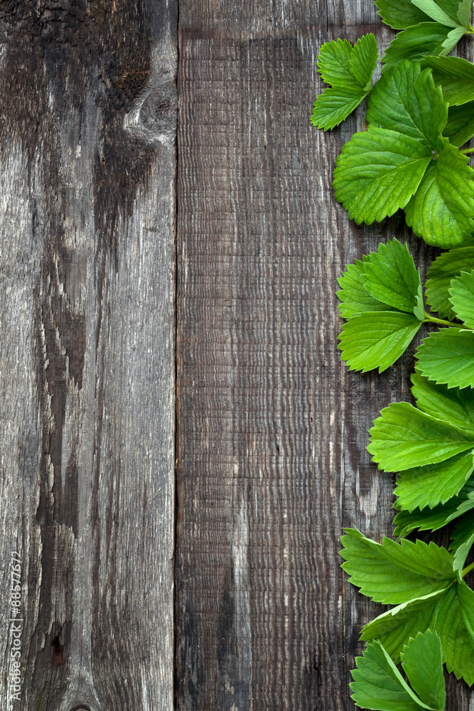Background with ripe strawberry on wooden surface. Background with ripe strawberry on wooden surface.