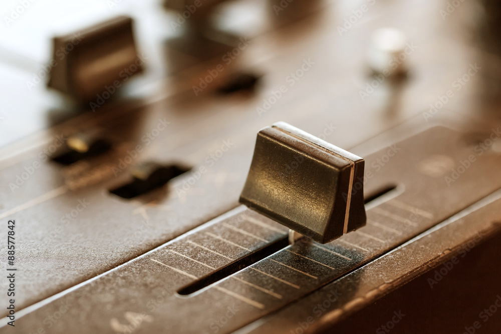 Crossfader on dj mixer in club Crossfader on dj mixer in club