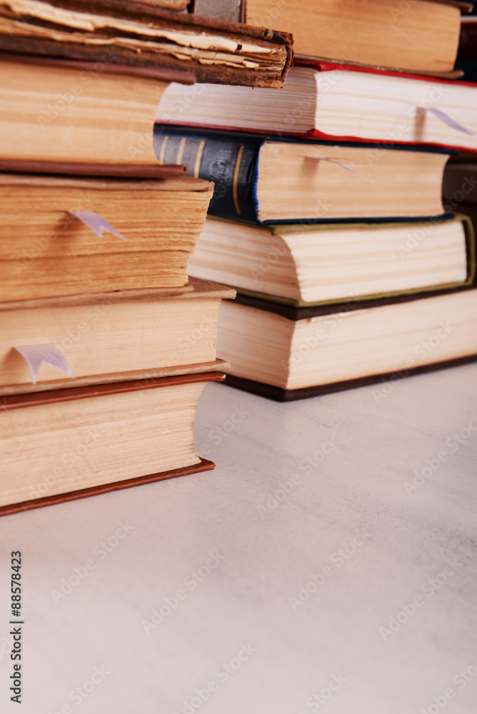 Stacks of books on table close up Stacks of books on table close up