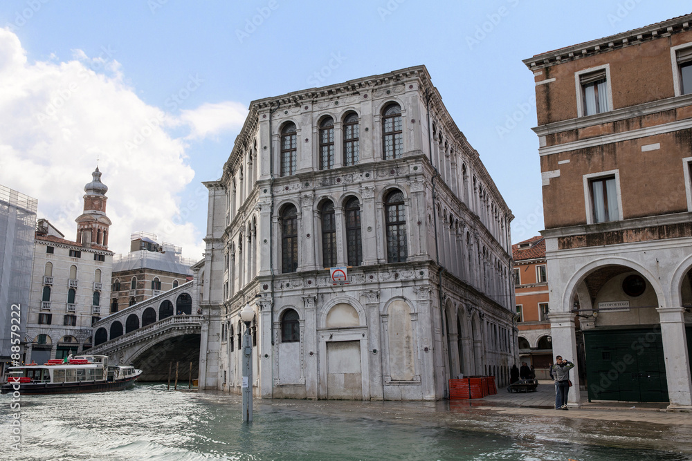 Classic view of Venice with canal and old buildings. Venice is one of the most popular tourist destinations in the world