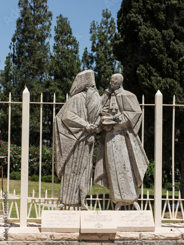 statue of Pope Paul VI and Patriarch Atenogoras I that is next t photo