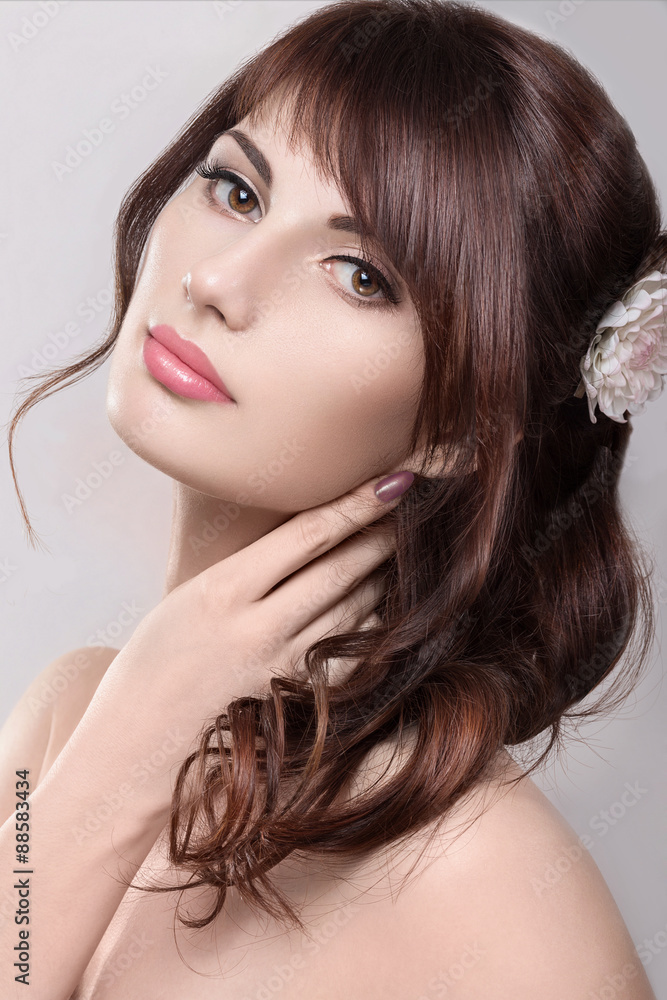 Naklejka premium Beautiful blond girl in the image of a bride with flowers. Beauty face. Wedding