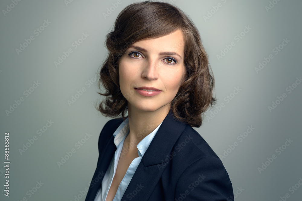 Attractive businesswoman with curly brown hair Attractive businesswoman with curly brown hair