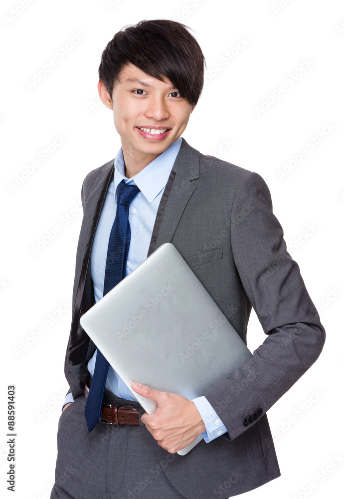 Young businessman hold with laptop computer Young businessman hold with laptop computer