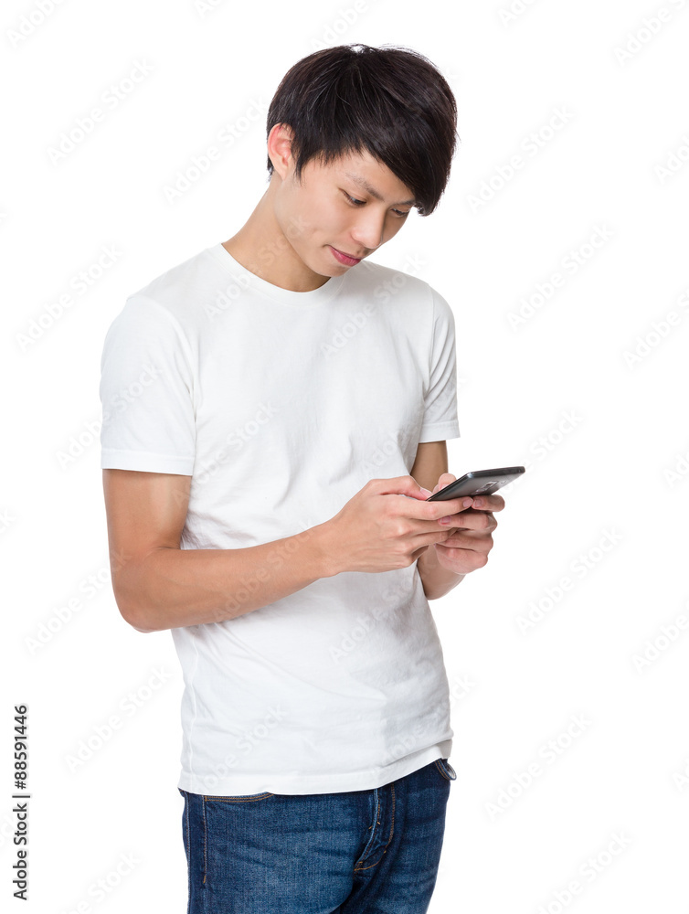 Man playing game on cellphone Man playing game on cellphone
