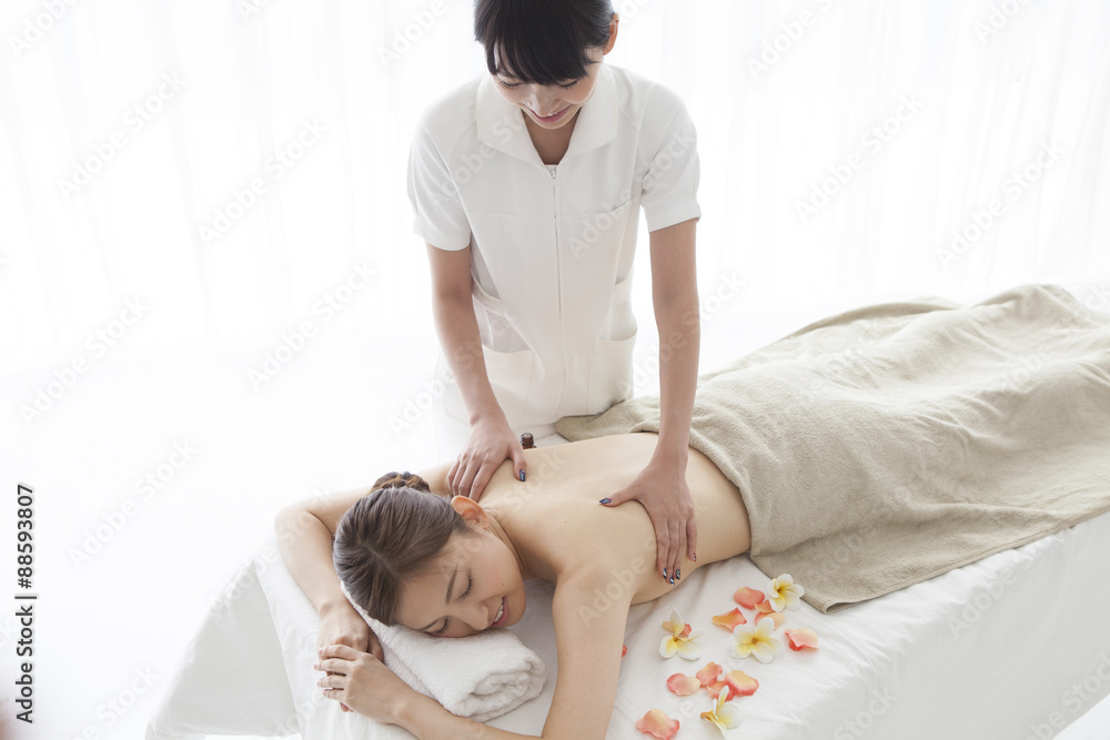 Young woman has received the aroma oil massage Young woman has received the aroma oil massage