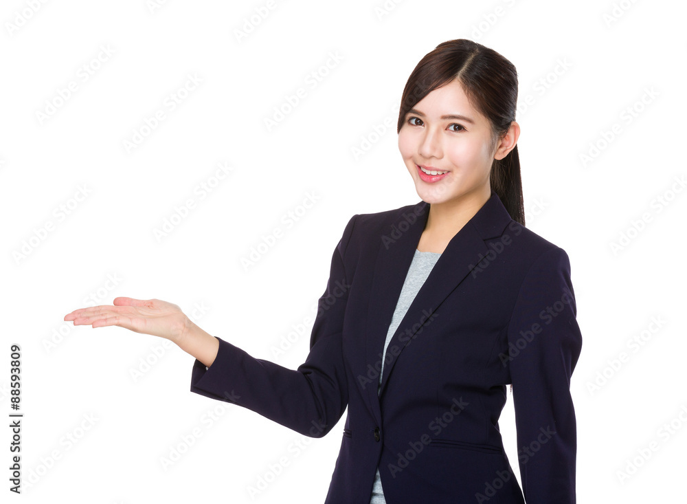 Young Businesswoman with hand presentation Young Businesswoman with hand presentation