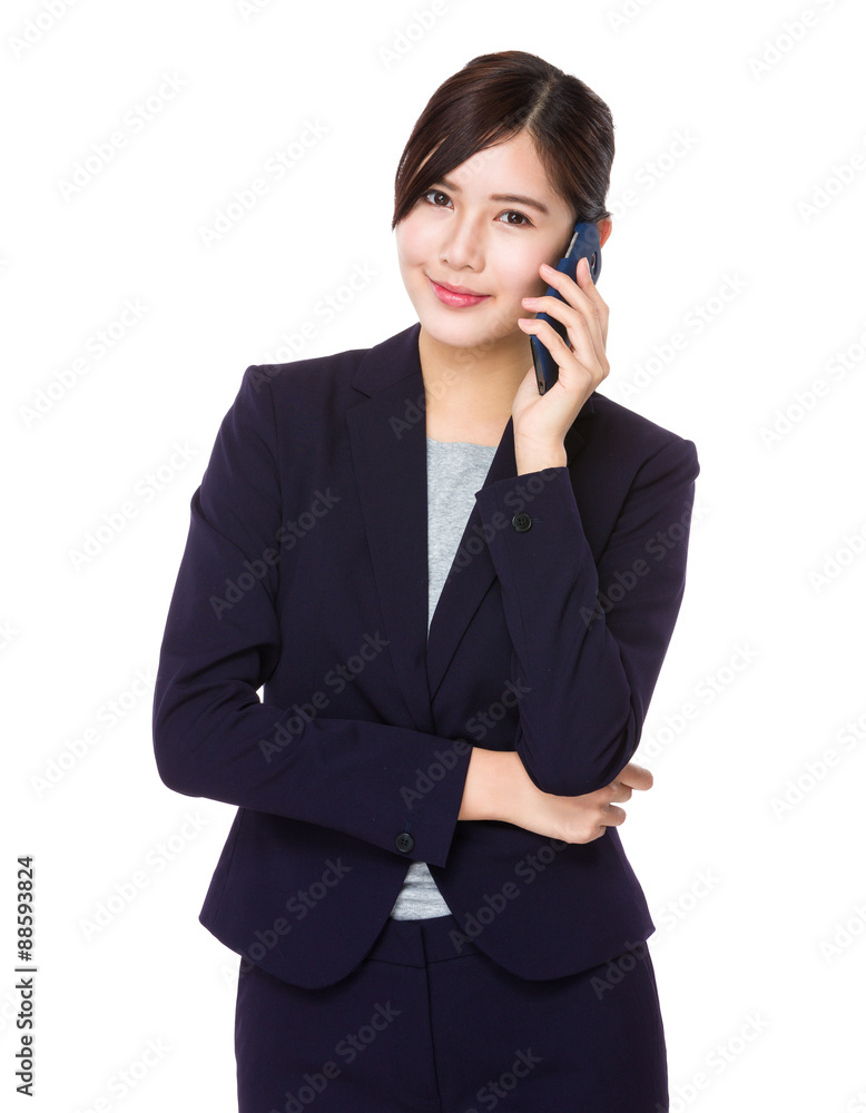 Asian Businesswoman chat on mobile phone Asian Businesswoman chat on mobile phone