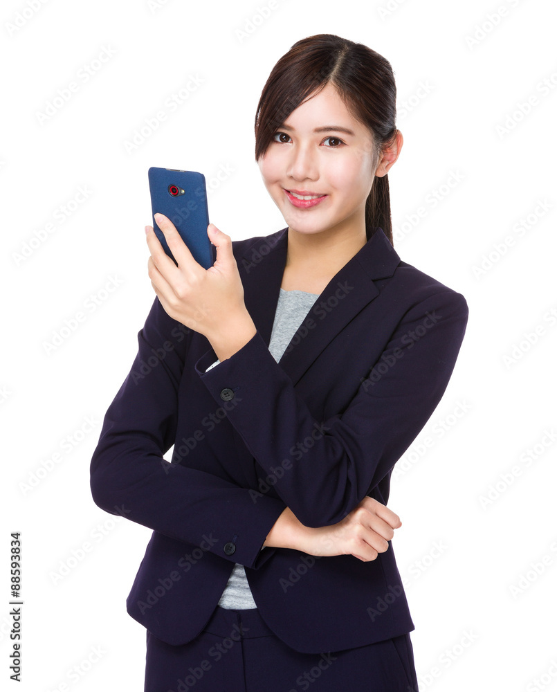 Young Businesswoman use of the smartphone Young Businesswoman use of the smartphone