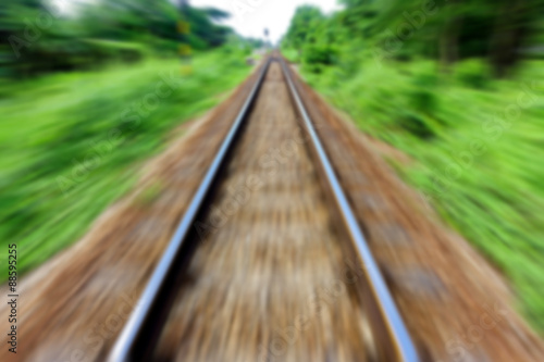 Motion blurred image of railway track on upcountry. © thawornnurak