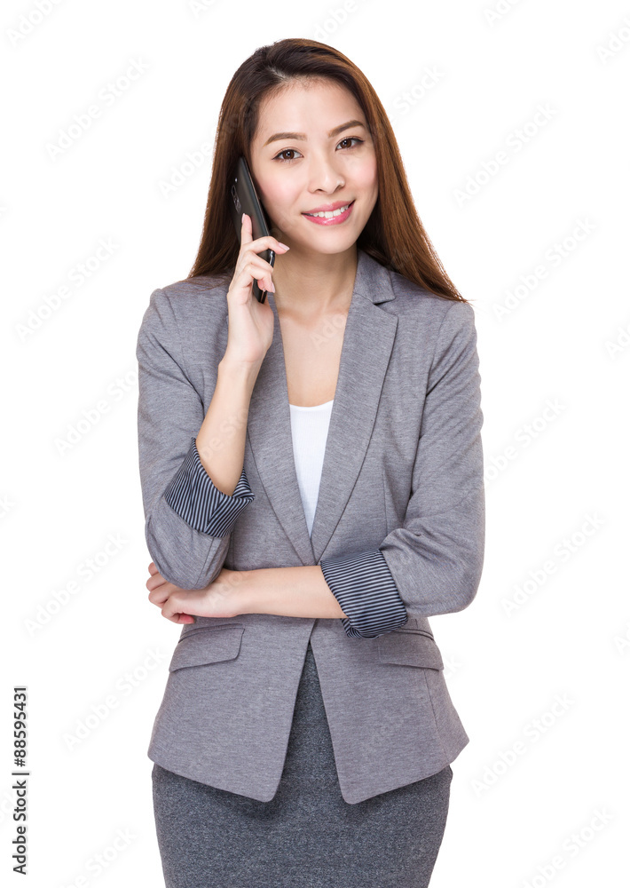 Asian young businesswoman chat on mobile phone Asian young businesswoman chat on mobile phone