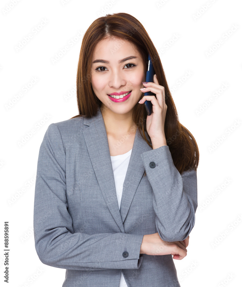 Young businesswoman talk to mobile phone Young businesswoman talk to mobile phone