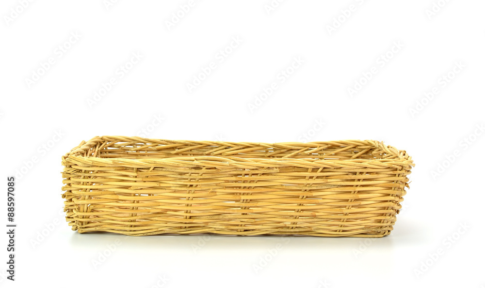 Obraz premium Empty wicker basket isolated on white