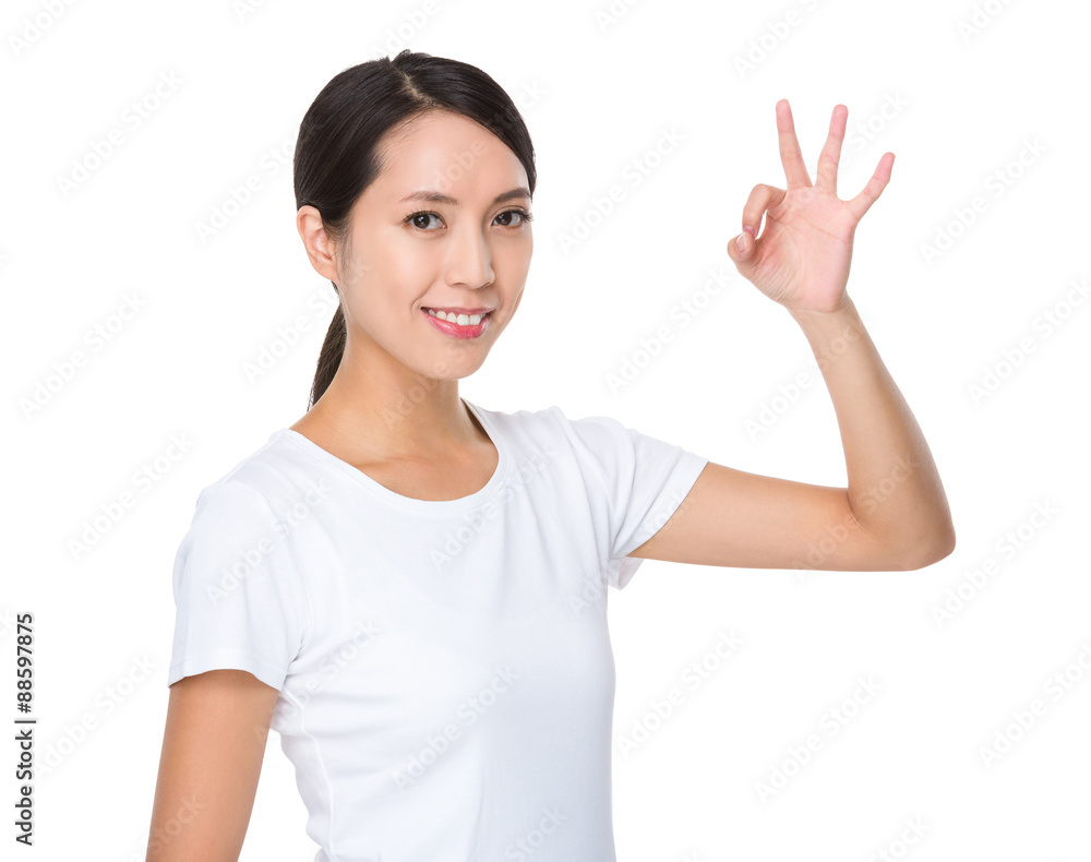 Young woman with ok sign gesture Young woman with ok sign gesture