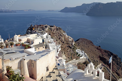 View of Oia town and old castle of Oia, Santorini, Greece.