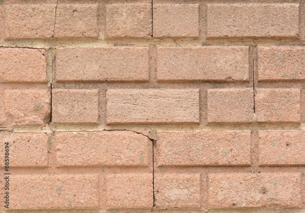 Fototapeta premium close up brick wall with cracks