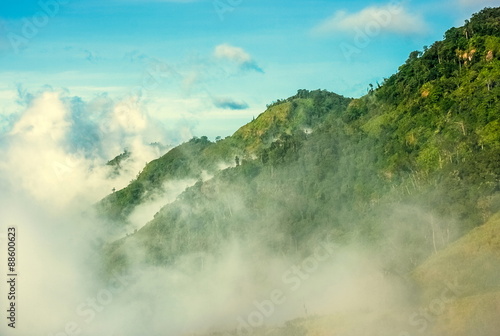 Clouds and fogs on the mountain photo