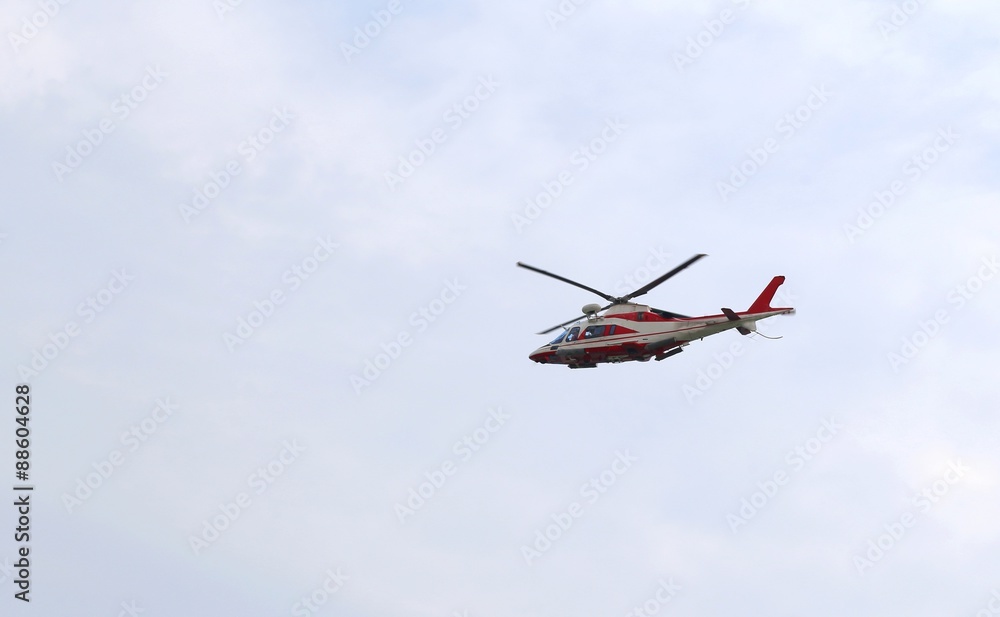 big helicopter of fireman flies in the sky during an emergency big helicopter of fireman flies in the sky during an emergency