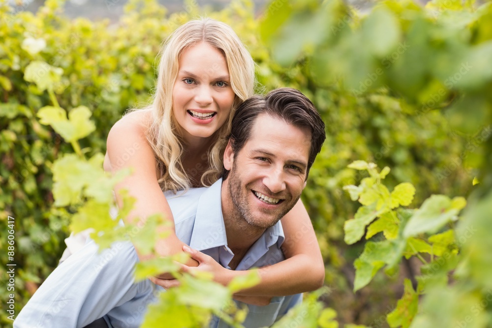 Young happy woman embracing young handsome man