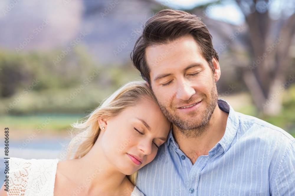Smiling couple on date relaxing with eye closed Smiling couple on date relaxing with eye closed