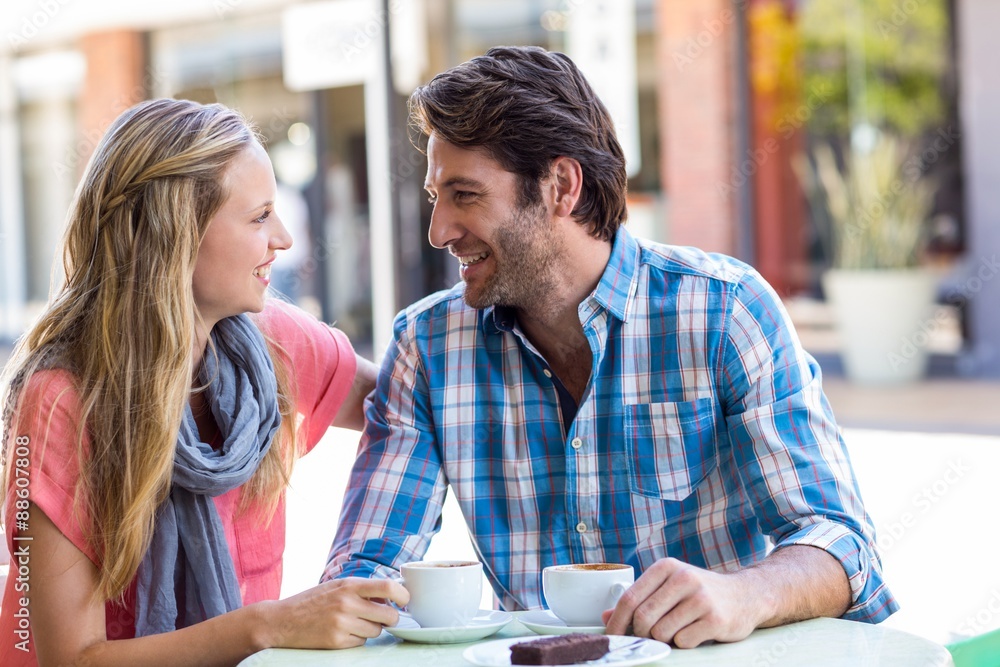 Young happy couple smiling at each other Young happy couple smiling at each other