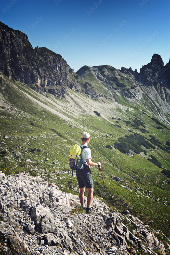 Rear view of male hiker during trekking Rear view of male hiker during trekking