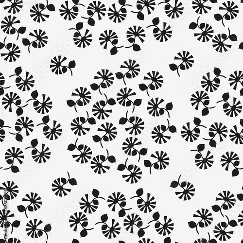 Black flowers on a white background.