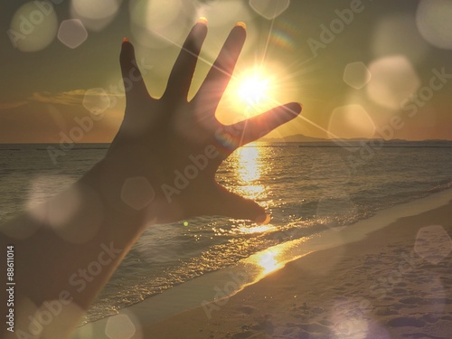sun between finger