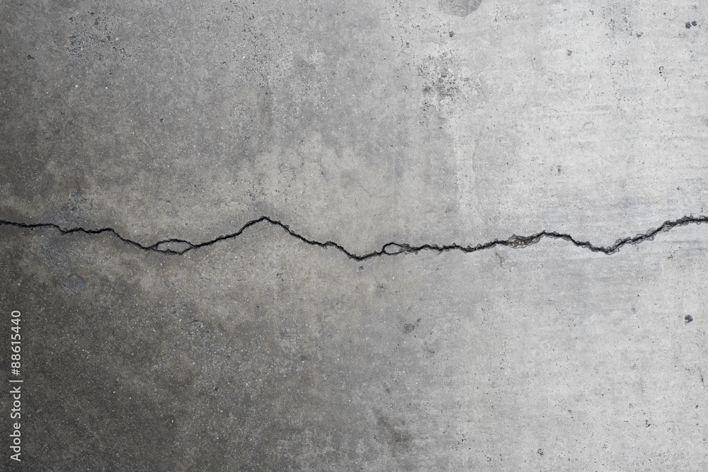 Fototapeta premium Cracking concrete on ground 4