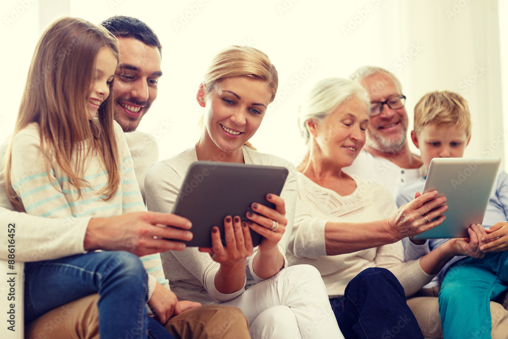 smiling family with tablet pc at home smiling family with tablet pc at home