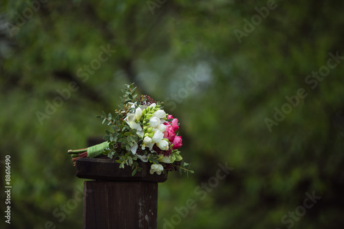 Wedding bouquet on a green background.