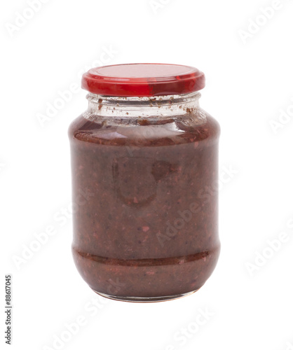 Tomato sauce jar on white background