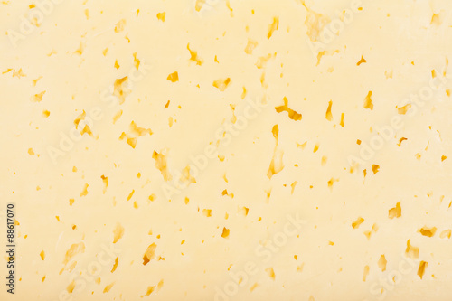 Fresh yellow cheese background