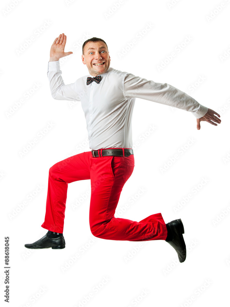 man in elegant clothes jumping up