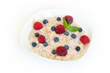 Oatmeal with different berries isolated