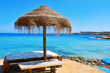 sunlounger and umbrella in Ibiza Island, Spain